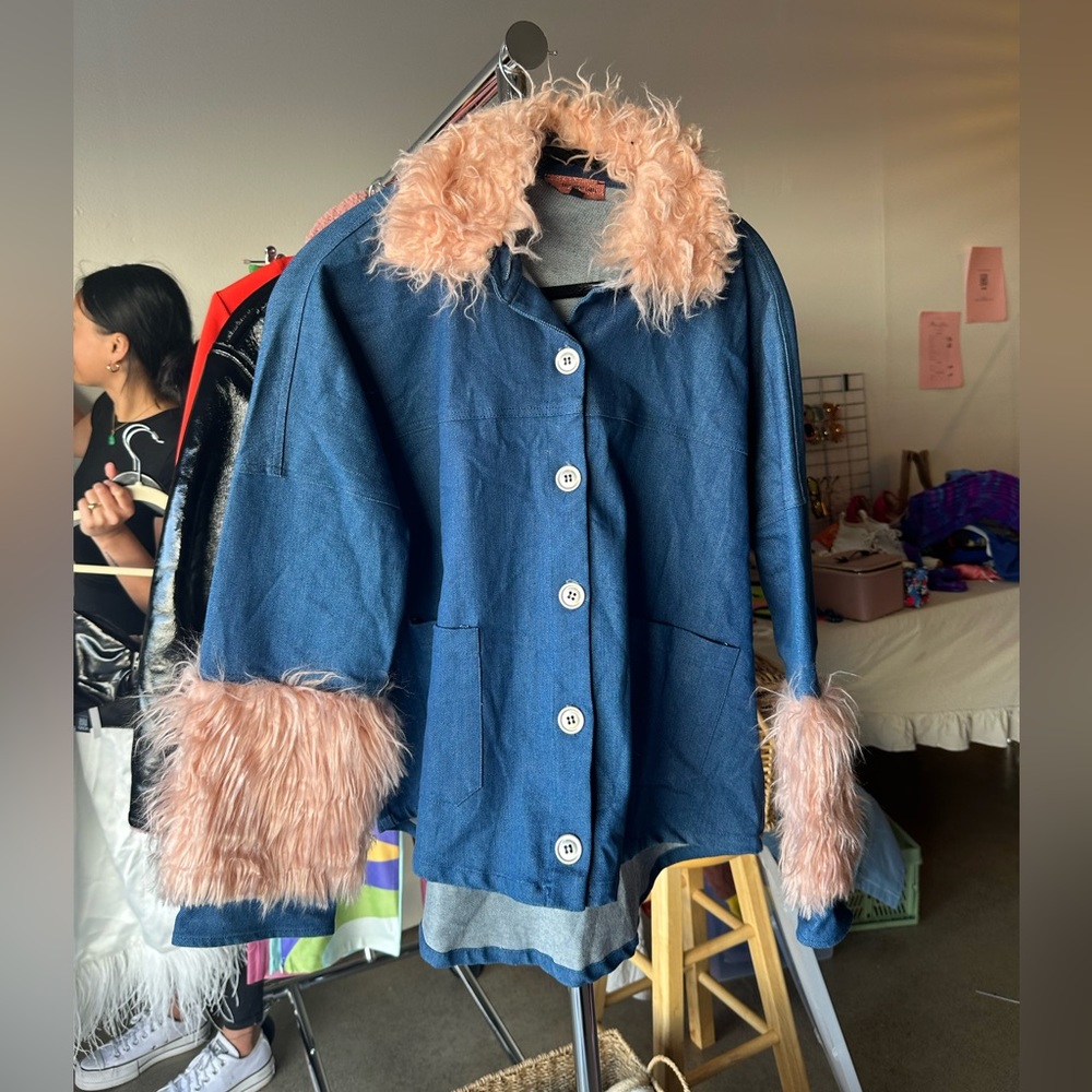 Denim jacket with pink fur